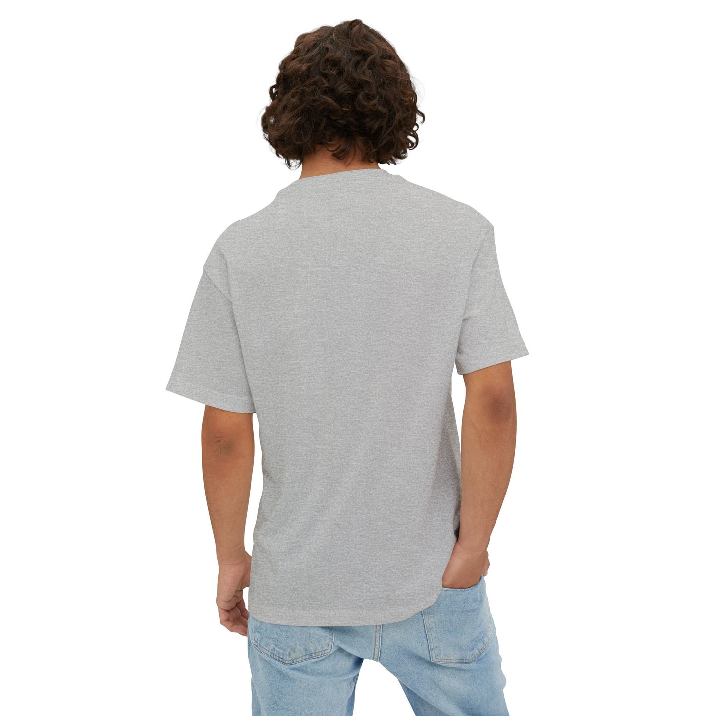 Person wearing a gray t-shirt and light blue jeans on a white background