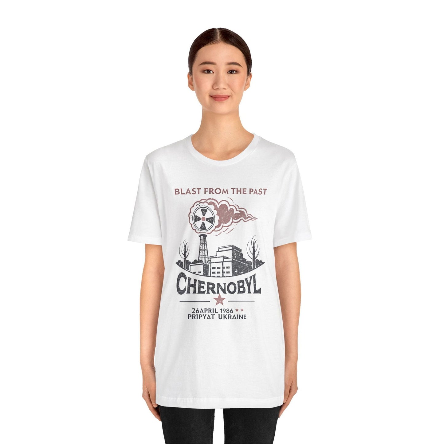 Woman wearing a Chernobyl Blast From the Past graphic tee with distressed Pripyat design