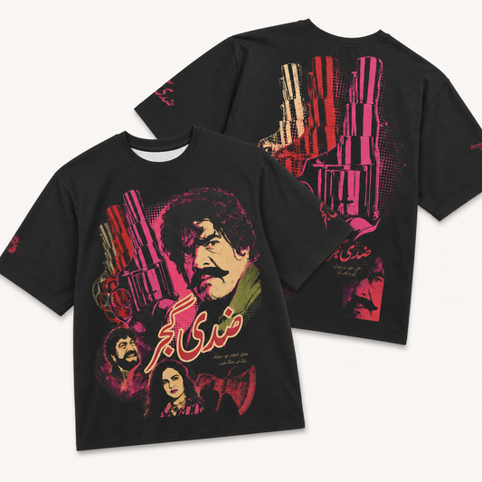 Ziddi Gujjar washed-black oversized tee showing front Urdu pop-art collage and back revolver graphic