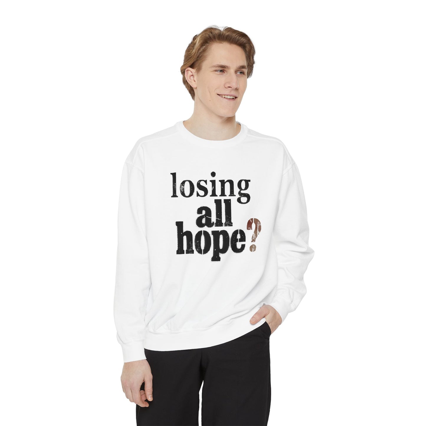 Person wearing a white sweatshirt with text on a white background