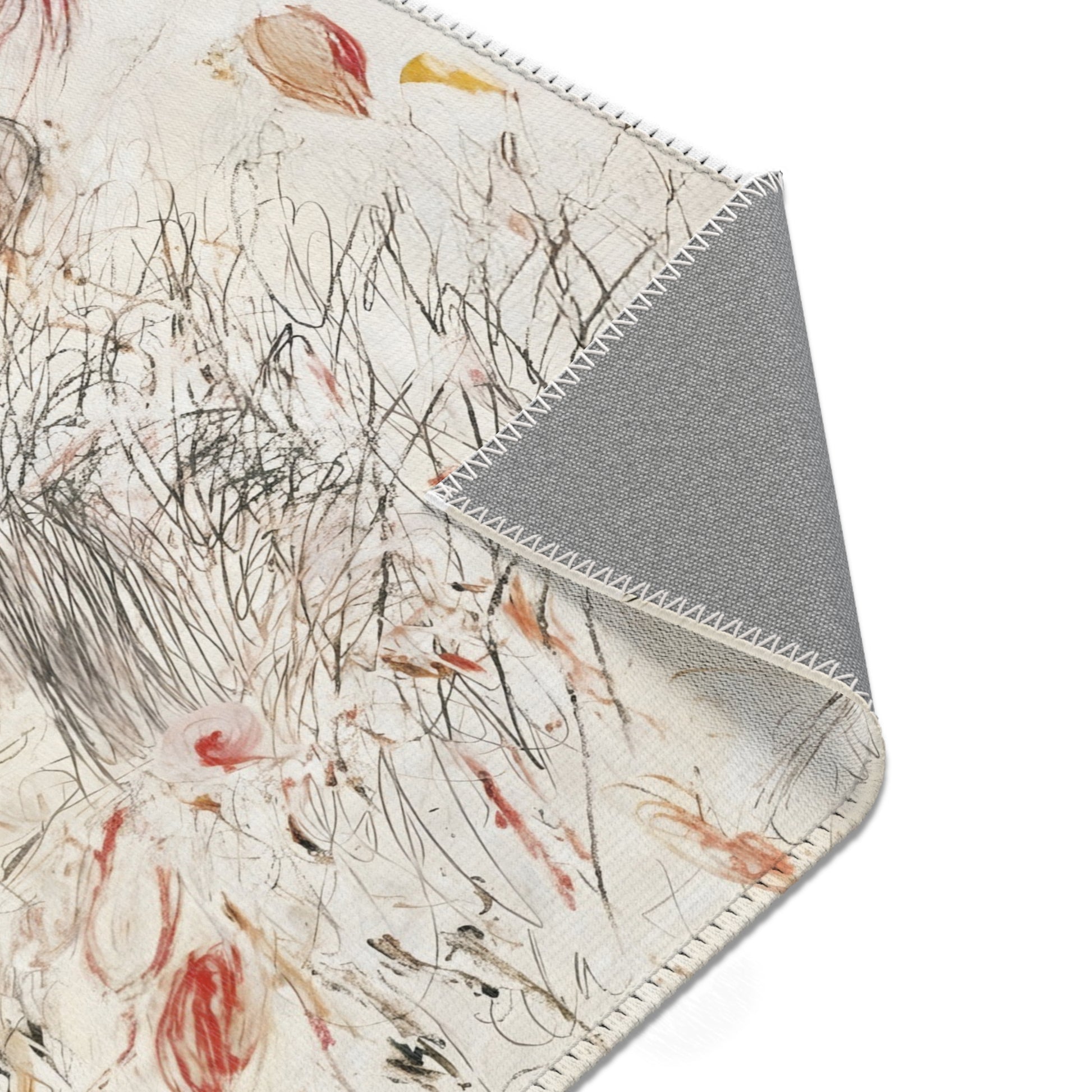 Close-up of a cream boho rug with expressive line art and abstract scribble details