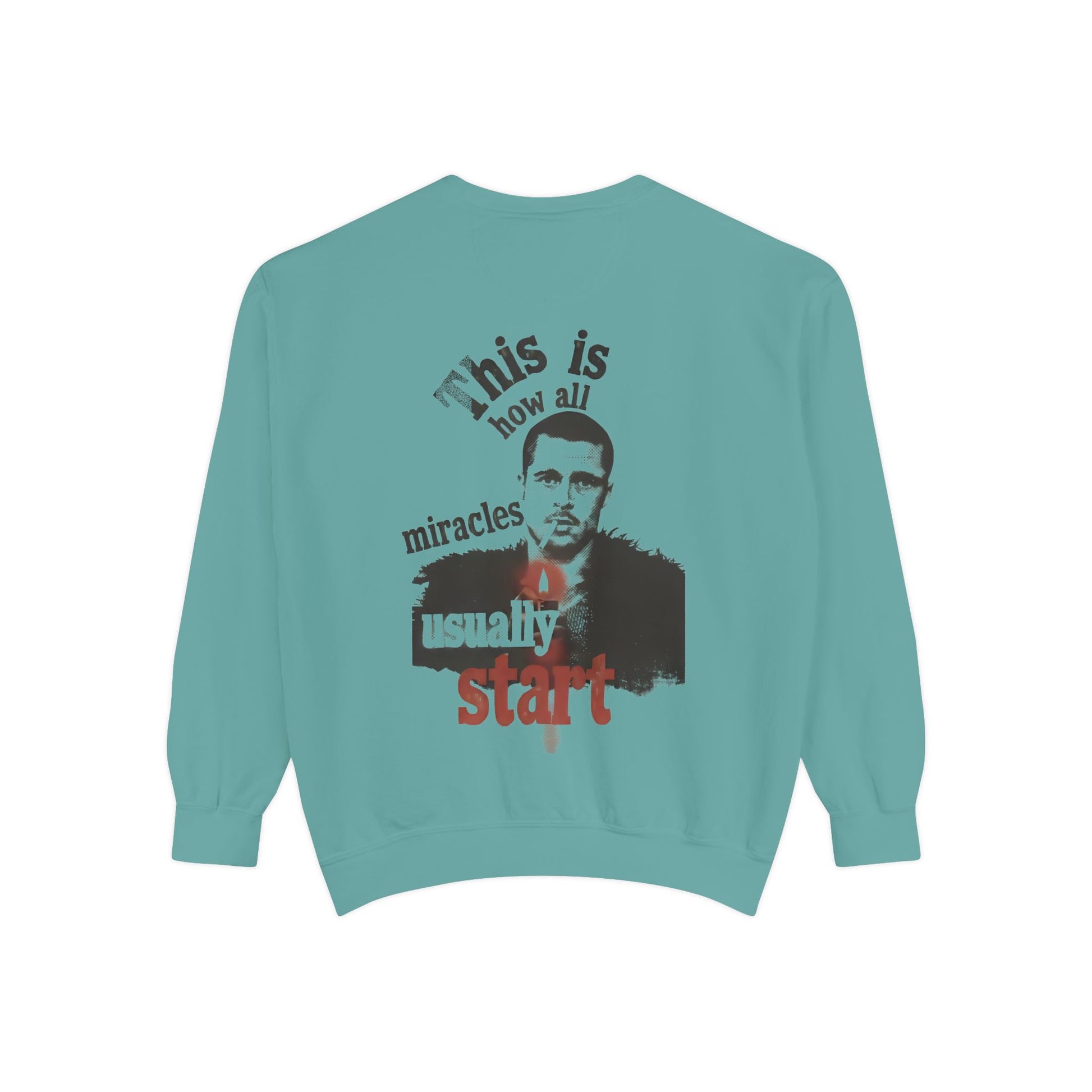 Teal sweatshirt with a graphic brad pitt illustration and typography "this is how all miracles usually start"