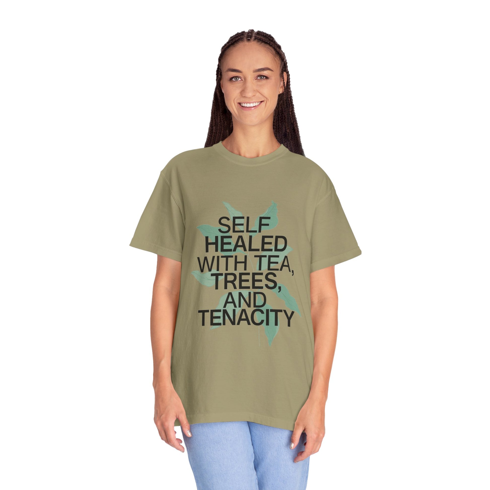 Person wearing a green t-shirt with text on a white background