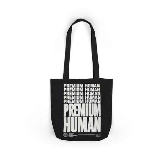 Premium Human black graphic canvas tote bag with stacked white typography