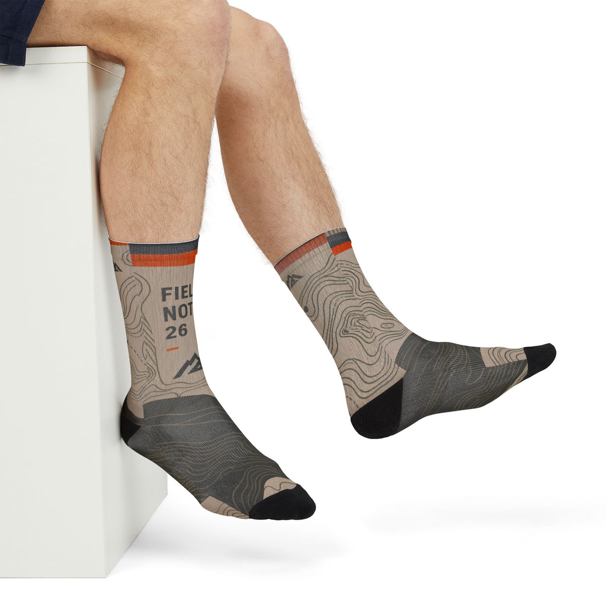 FIELD NOTES 26 topographic crew socks with sand, charcoal and burnt orange contour-map design.