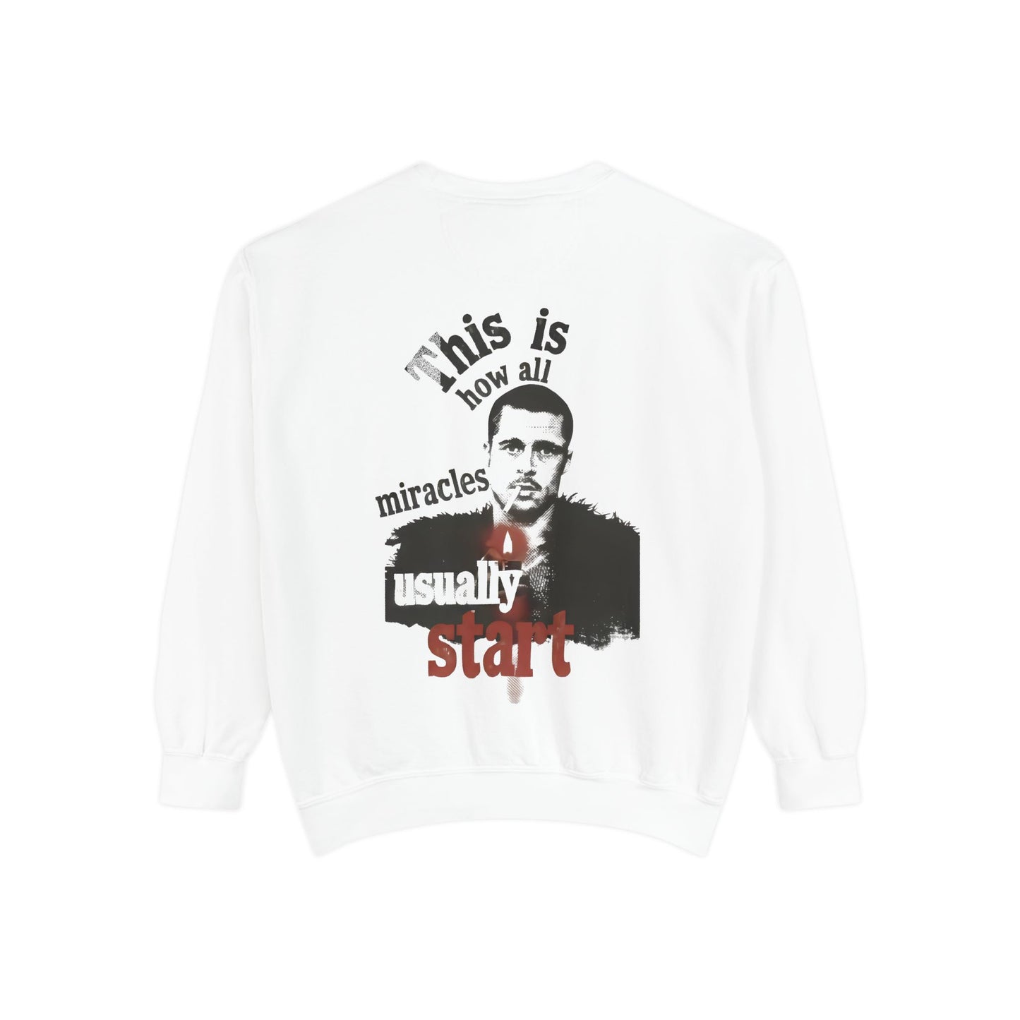 White sweatshirt with a graphic design featuring brad pitt illustration and typography "this is how all miracles usually start"