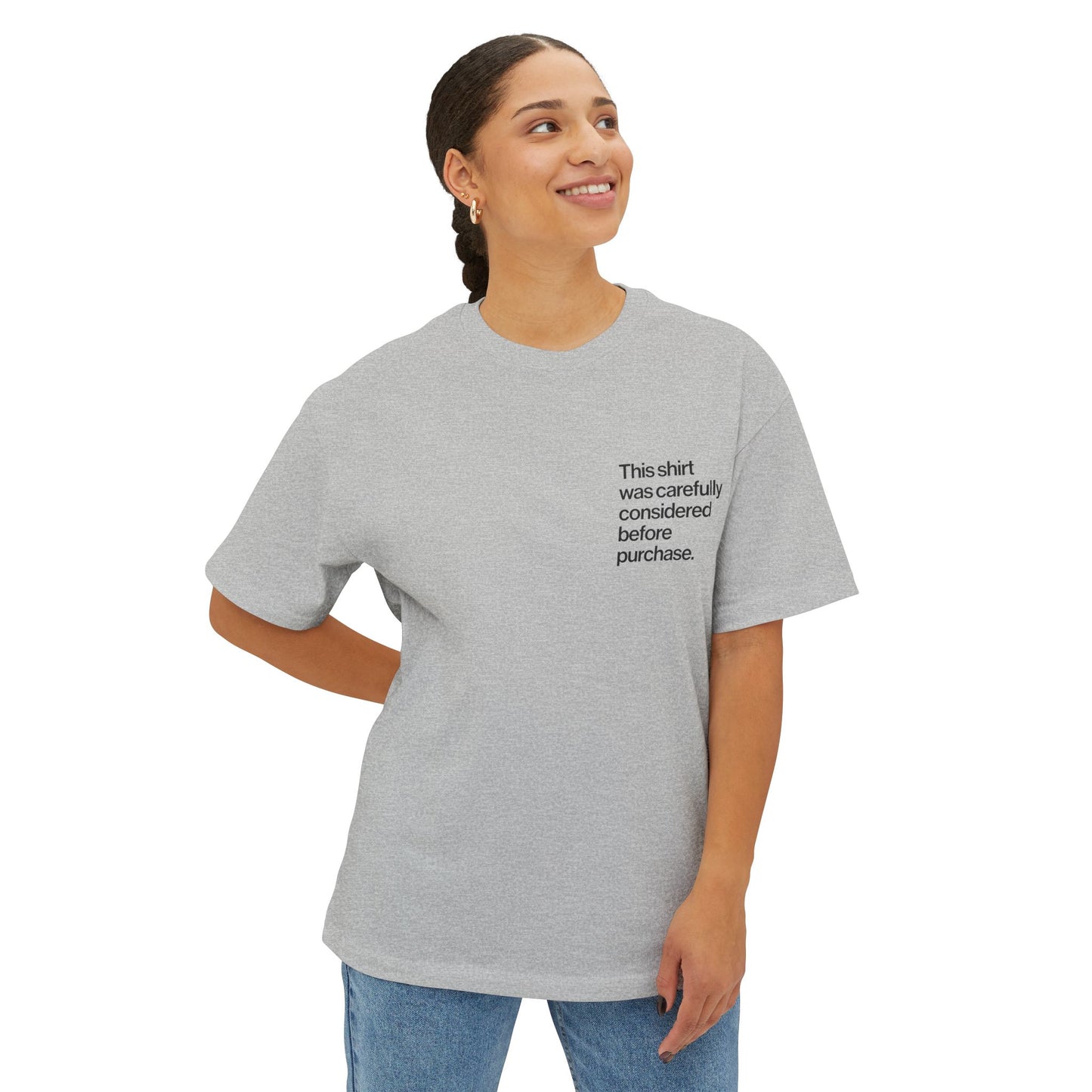 Person wearing a gray Introvert T Shirt with minimalist Helvetica left-chest text, subtle design for quiet humor