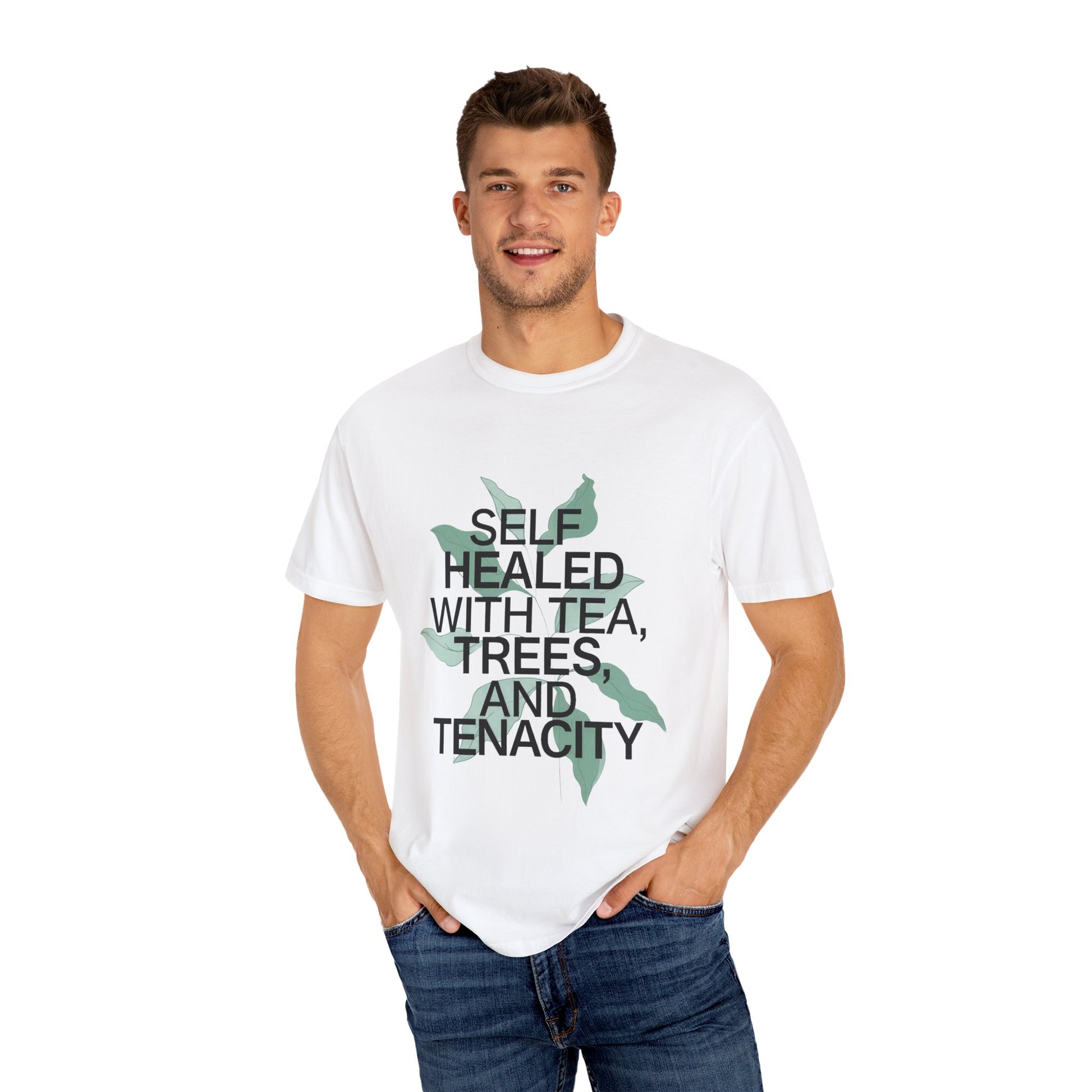 Man wearing a white t-shirt with text and a graphic design on a white background