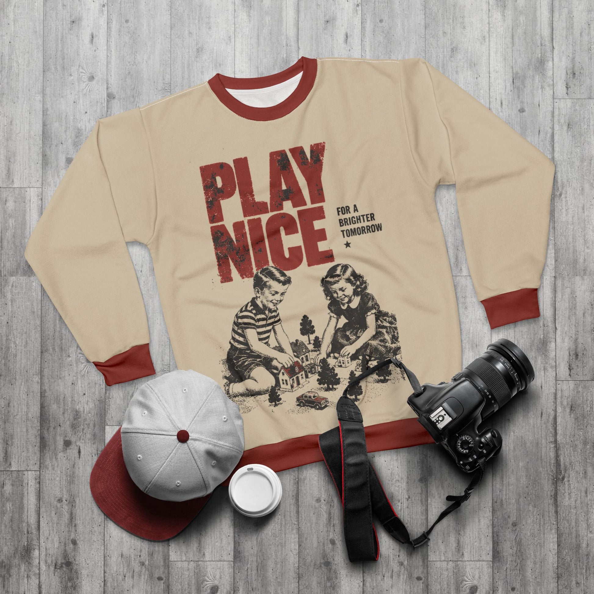 Play Nice alternative streetwear sweatshirt with beige body and red trim