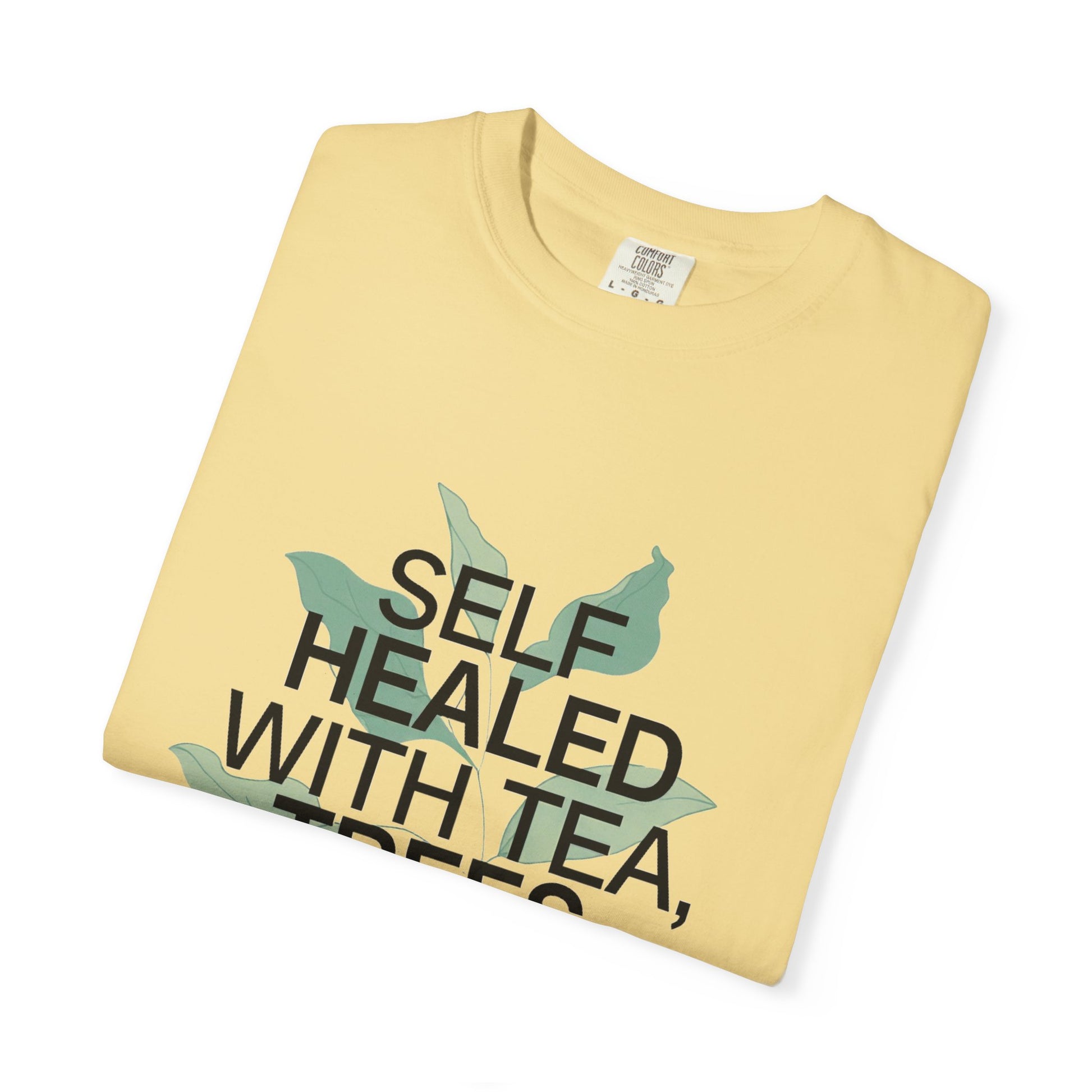 Folded yellow t-shirt with text and graphics on a white background