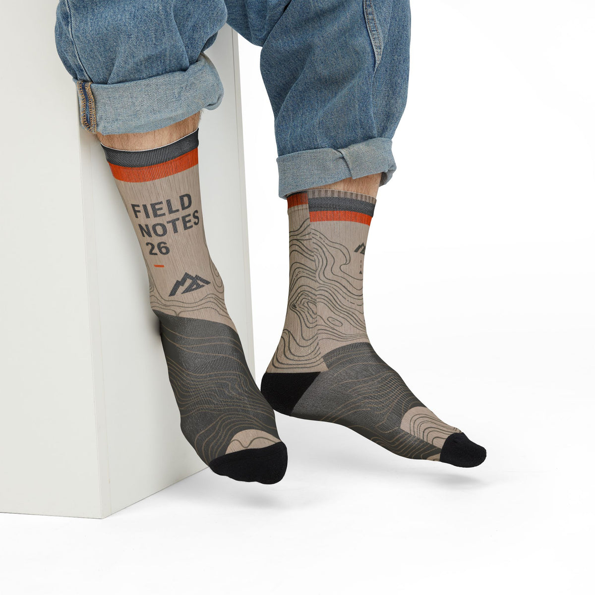 FIELD NOTES 26 topographic crew socks with sand, charcoal and burnt orange contour-map design.