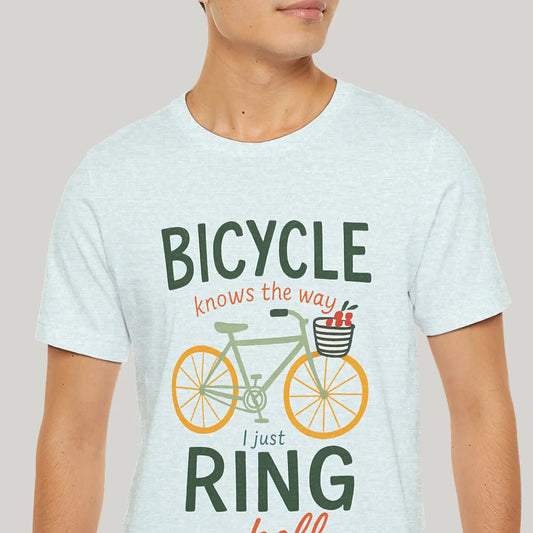 Light blue t-shirt with bicycle graphic and text on a plain background