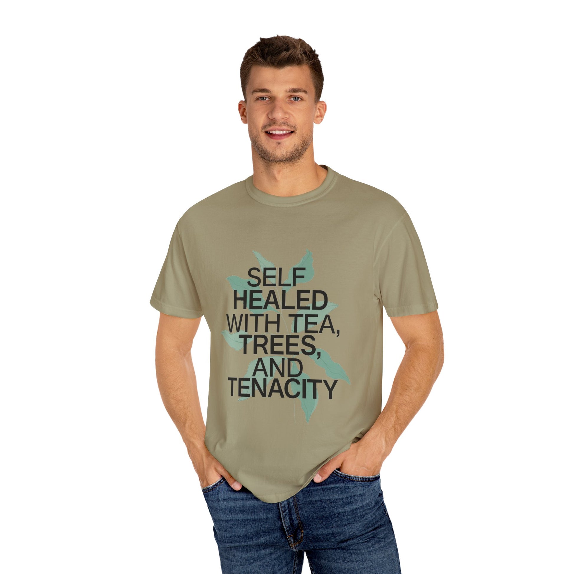 Man wearing a green t-shirt with text on a white background