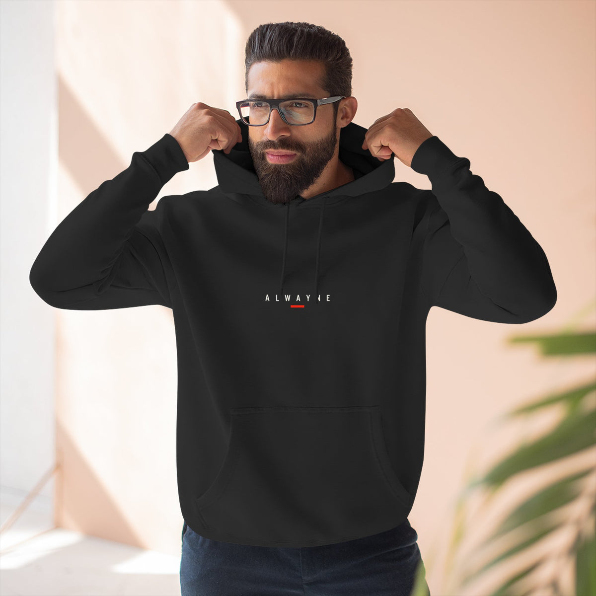 Alwayne Still Moving black three-panel fleece hoodie with front identifier and back graphic