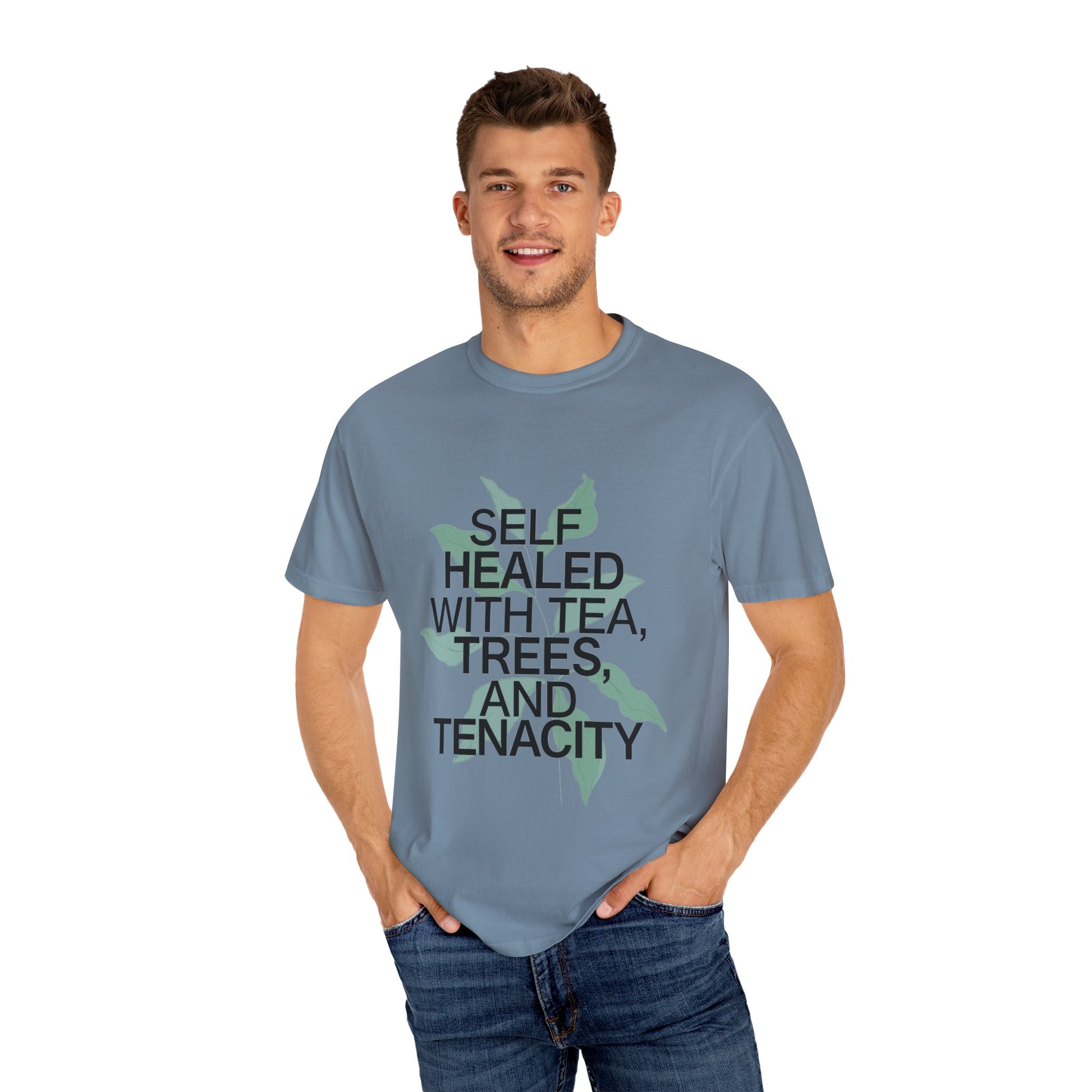 Man wearing a blue t-shirt with text on a white background