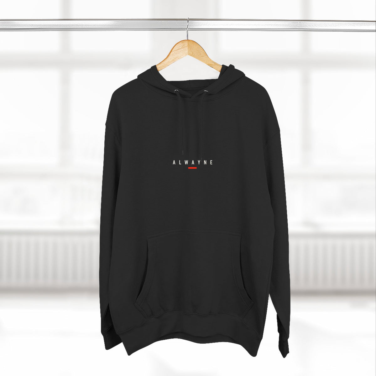 Alwayne Still Moving black three-panel fleece hoodie with front identifier and back graphic