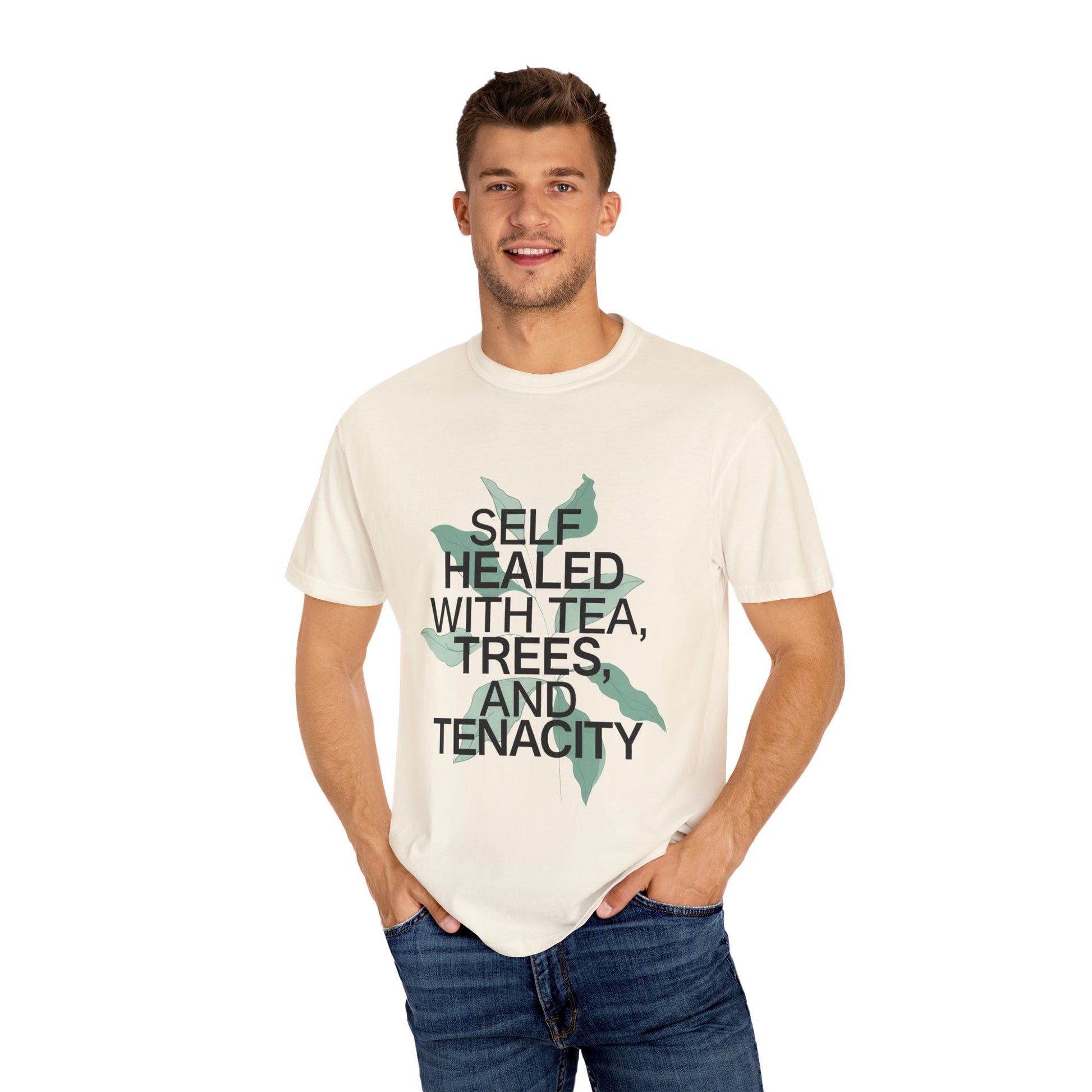 Man wearing a white t-shirt with text and a graphic design on a white background