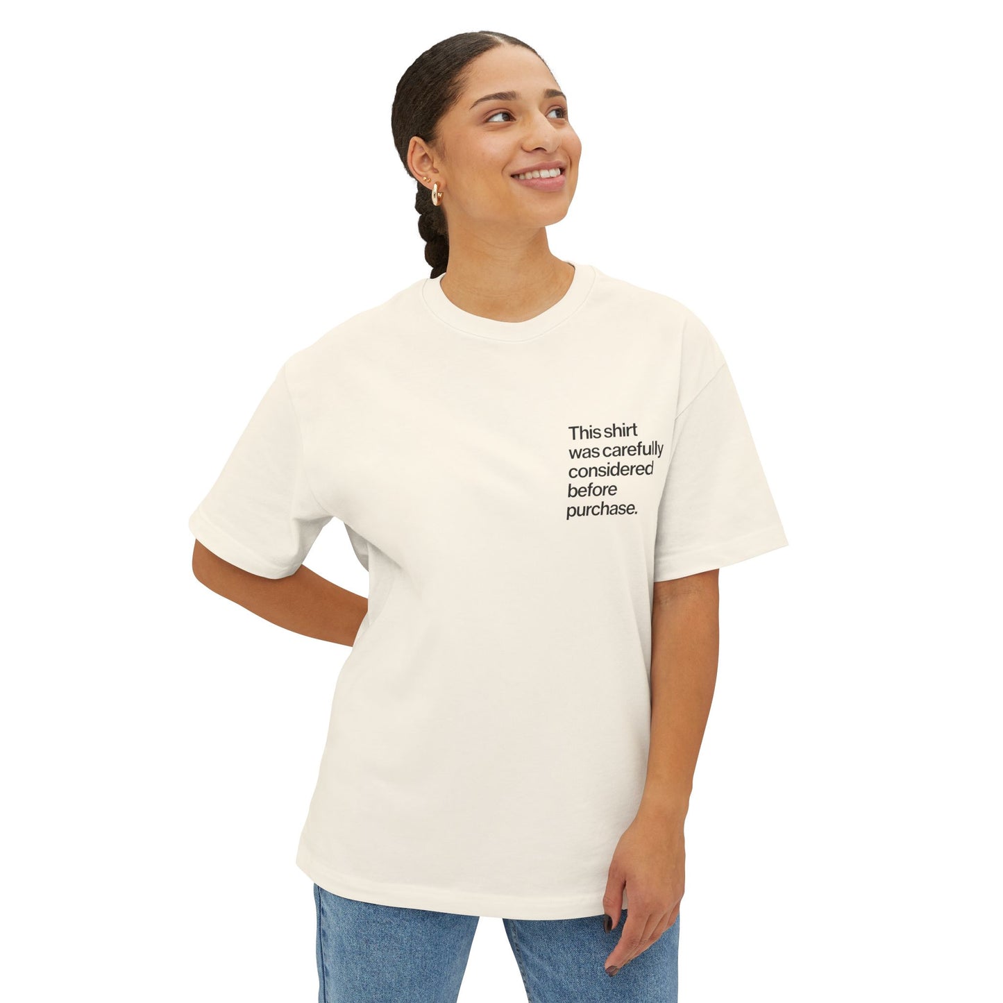 Woman wearing a white Introvert T Shirt with minimalist Helvetica left-chest text, subtle design for quiet humor