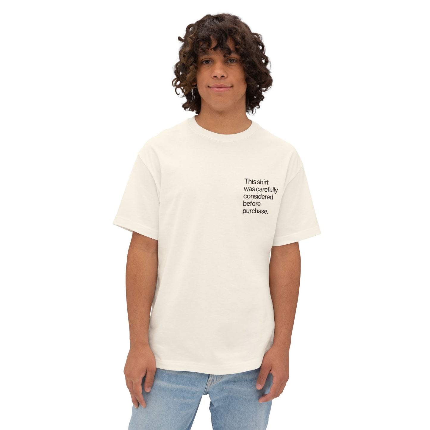 Person wearing a white t-shirt with text on a white background