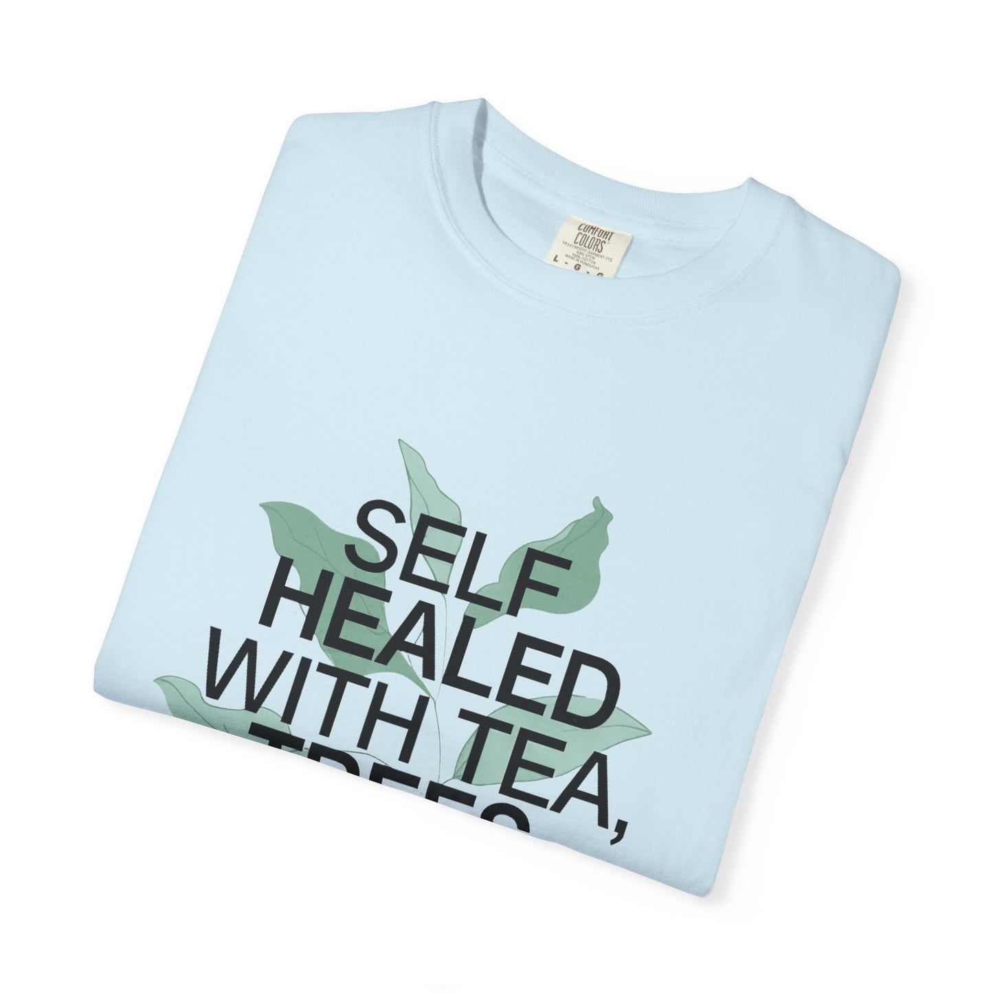Light blue t-shirt with text 'Self Healed with Tea' on a white background
