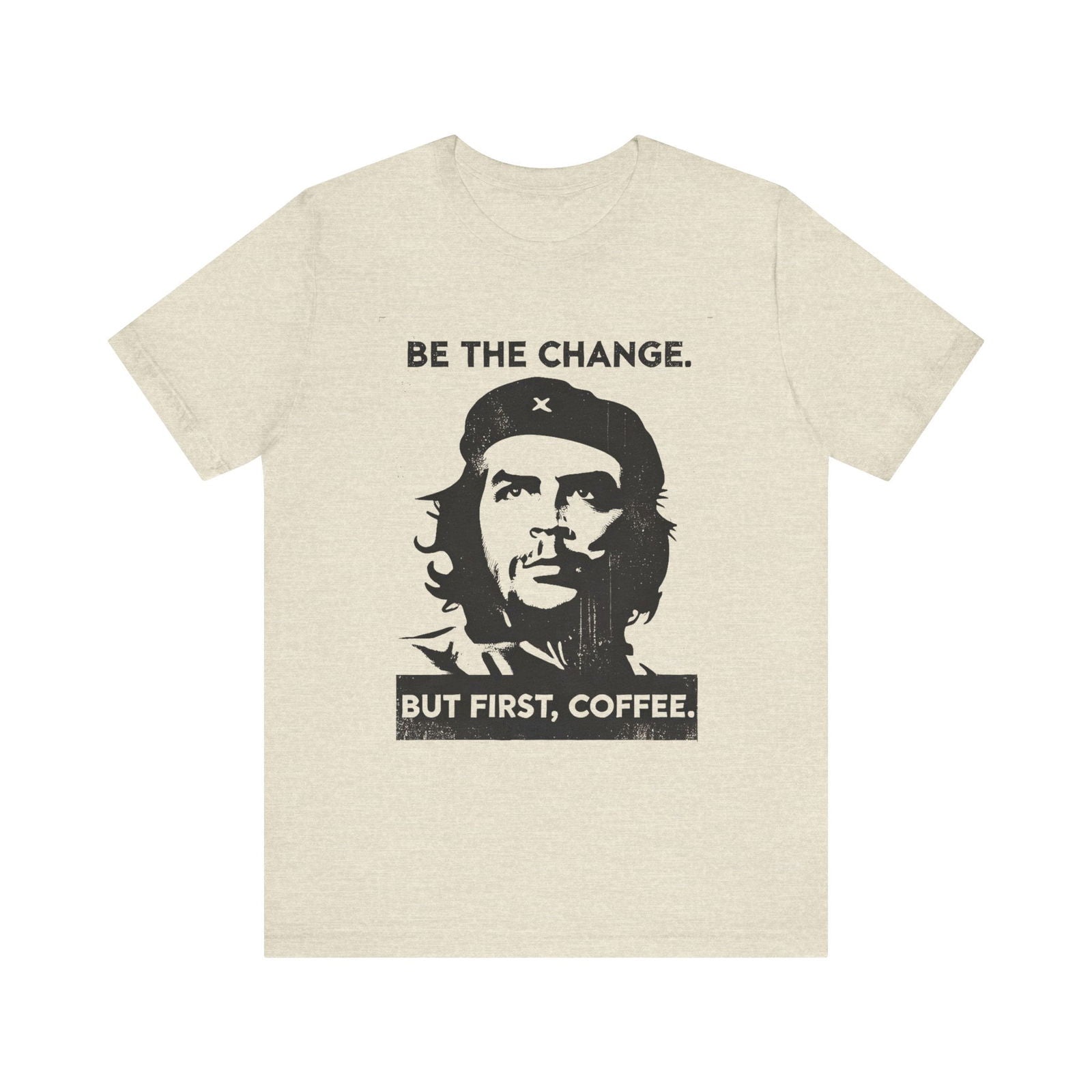 Coffee First graphic tee with portrait artwork and the line Be the change, but first coffee