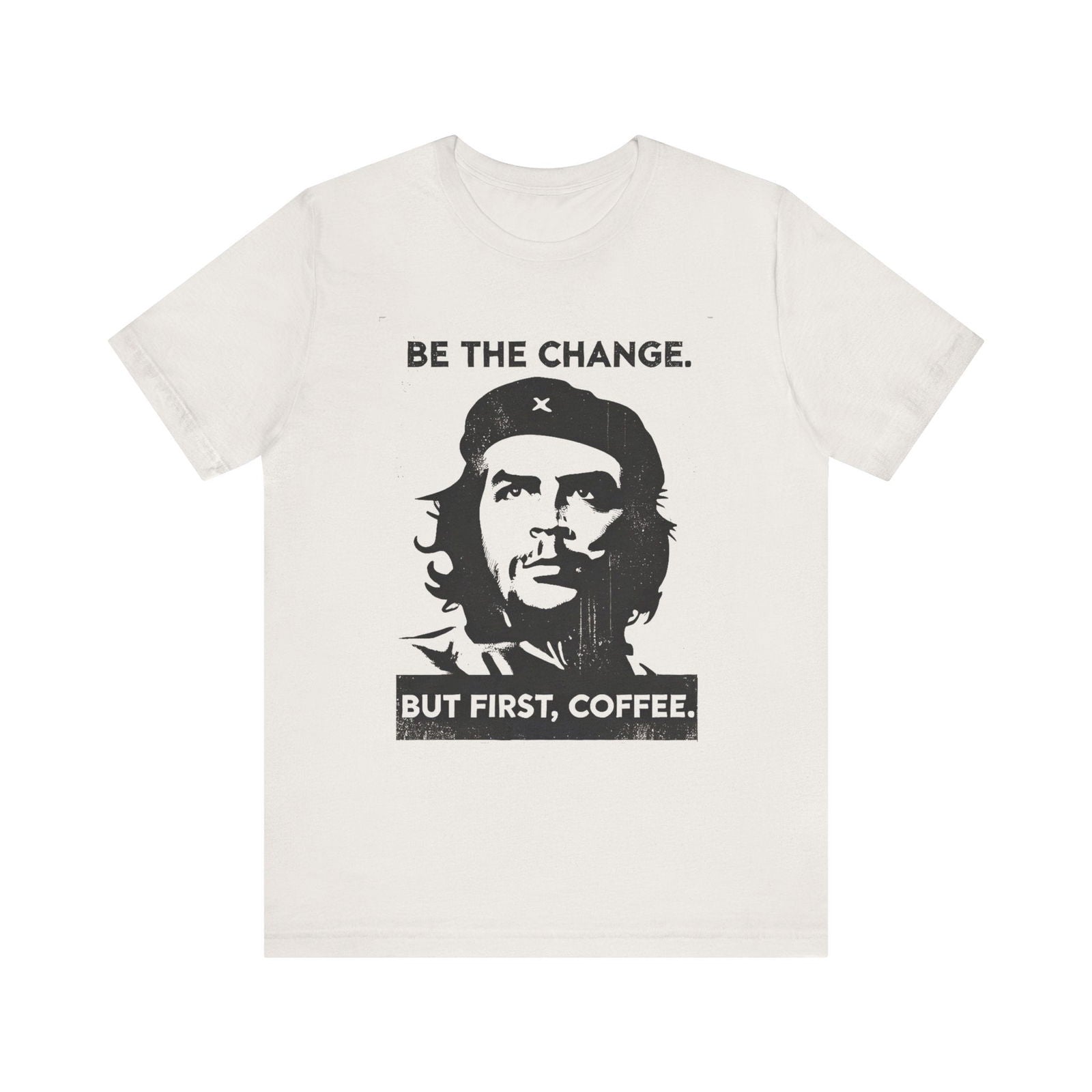 Coffee humor T-shirt showing the Be the change, but first coffee front graphic