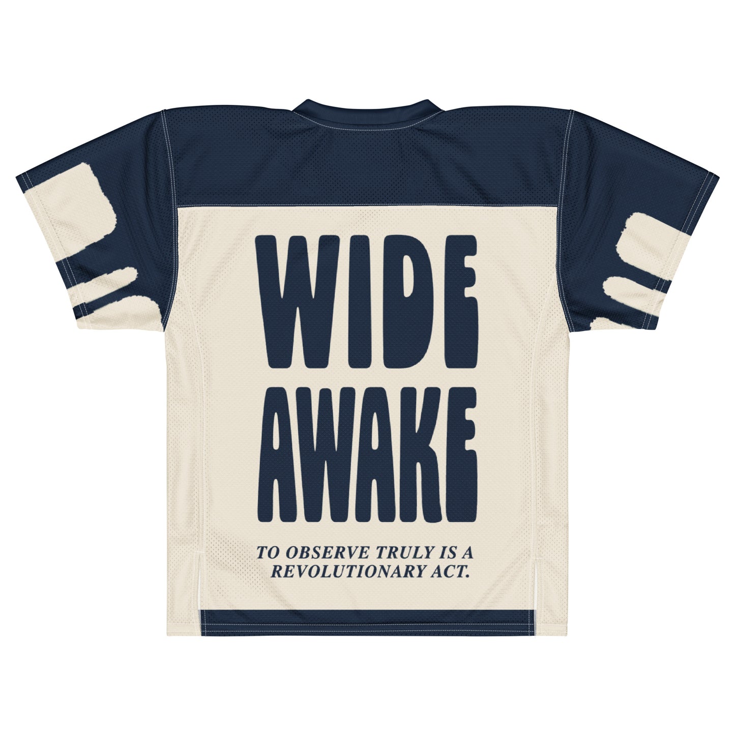 Back view of the Gravity of Perception mesh jersey in navy and off-white. It features bold, vertical block lettering that reads "WIDE AWAKE" above the philosophical statement, "To observe truly is a revolutionary act".