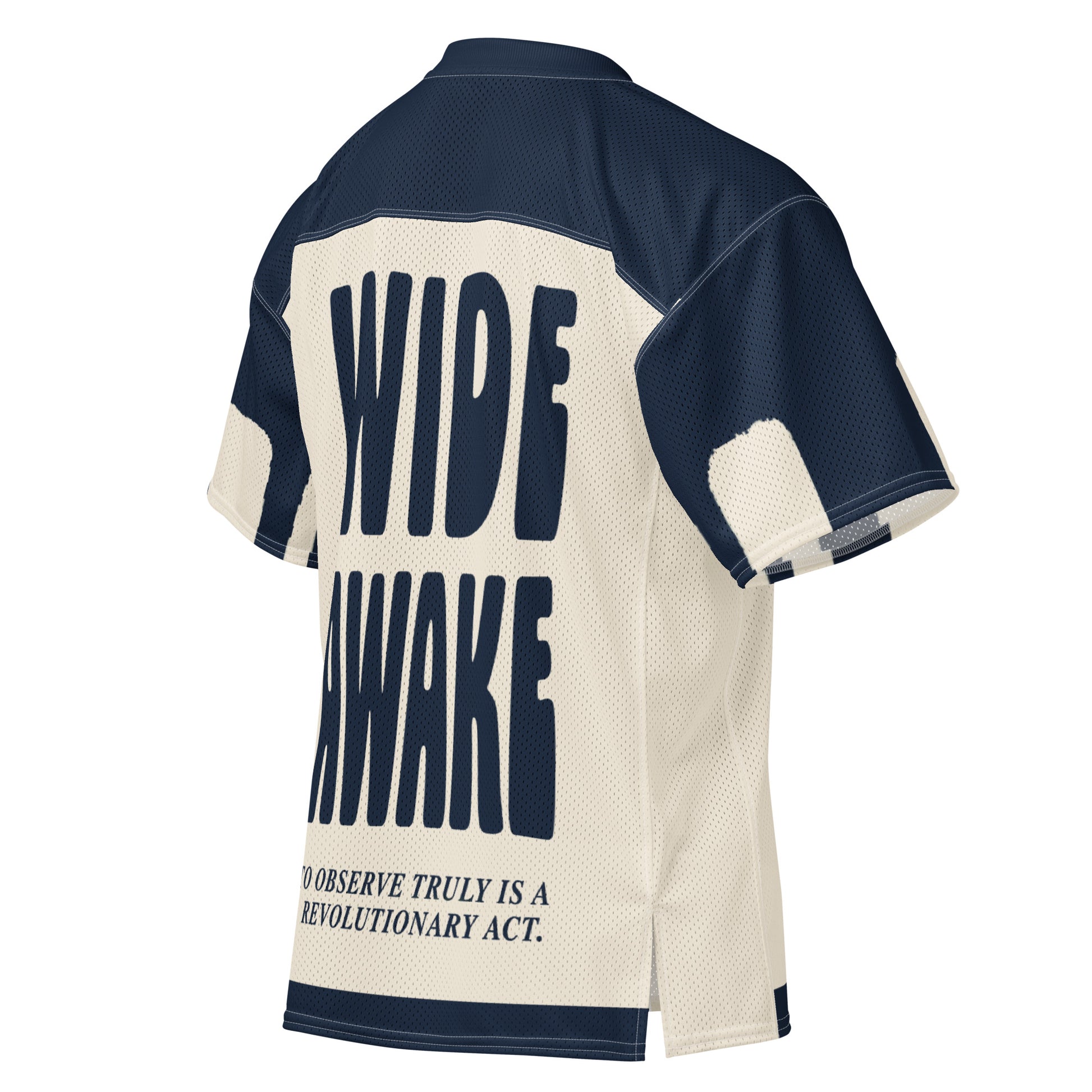 3/4 back product shot of the navy and cream Gravity of Perception AOP jersey, showcasing the vertical typographic design on breathable athletic mesh fabric.