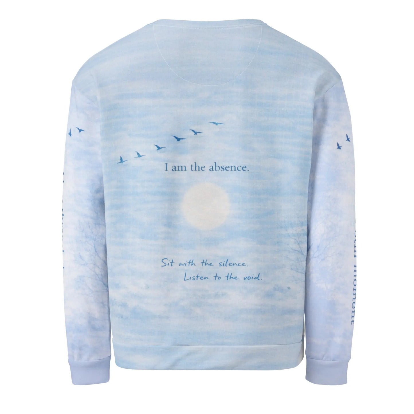 Back view of cloud print quote sweatshirt showing “I am the absence” with birds flying across a soft sky and cloud background