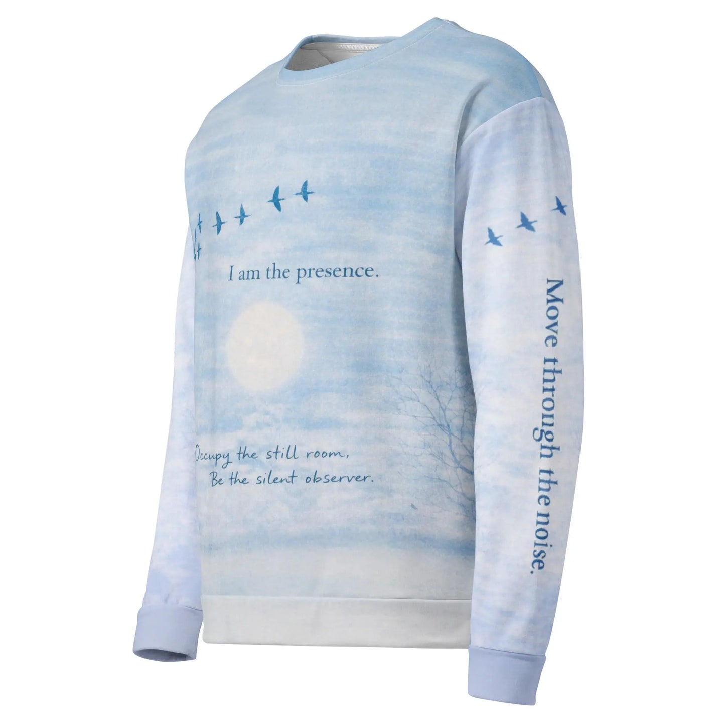 Angled front view of cloud print quote sweatshirt showing “I am the presence” text with birds in flight and “Move through the noise” printed on the sleeve