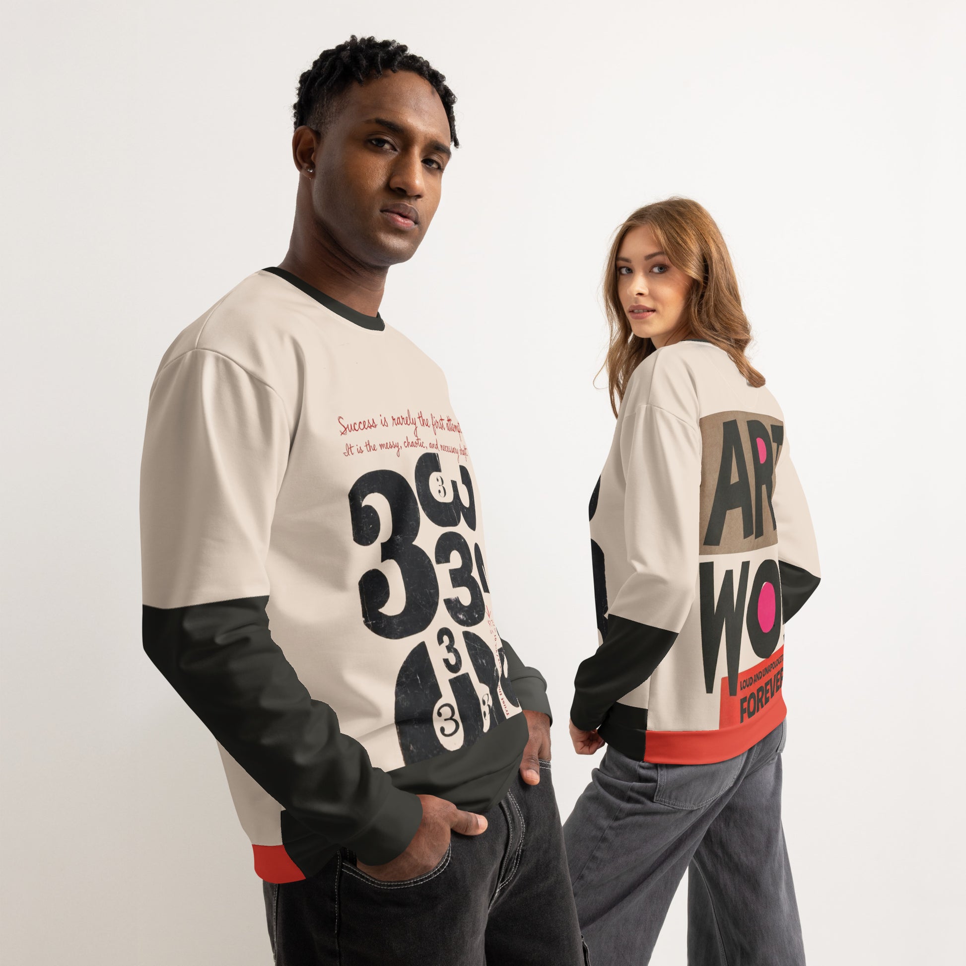 Male and female models wearing the Process Vol. 01 graphic crewneck, posed side by side; the male model faces forward showing the distressed “333” draft typography on the front, while the female model turns slightly to reveal the bold “ART WORK” back graphic, contrasting quiet process with loud final output.