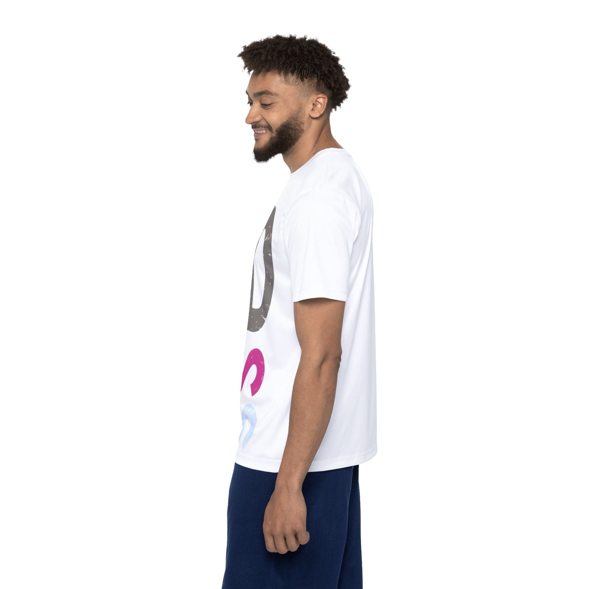 Man wearing white kindness graphic tee with bright multicolor lettering