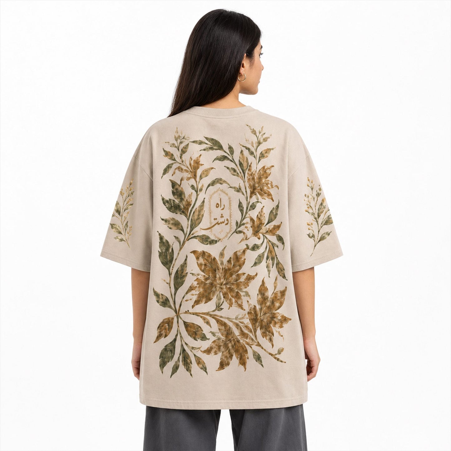 Raah-e-Dasht Oversized Botanical Tee worn by female model back view showing full botanical artwork