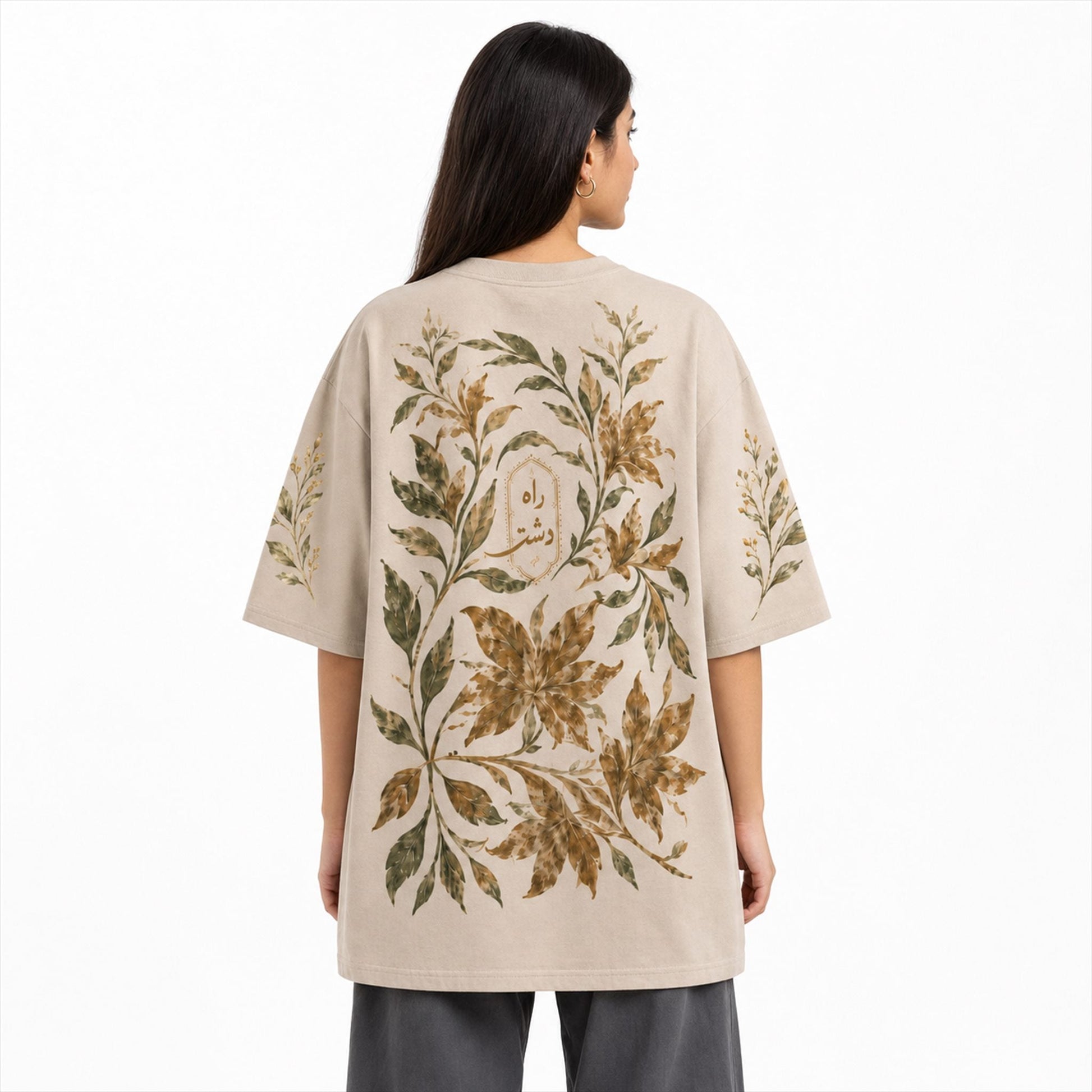 Raah-e-Dasht Oversized Botanical Tee worn by female model back view showing full botanical artwork